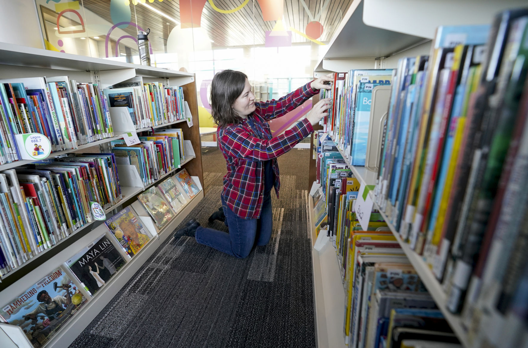 Pinney Library stacking books